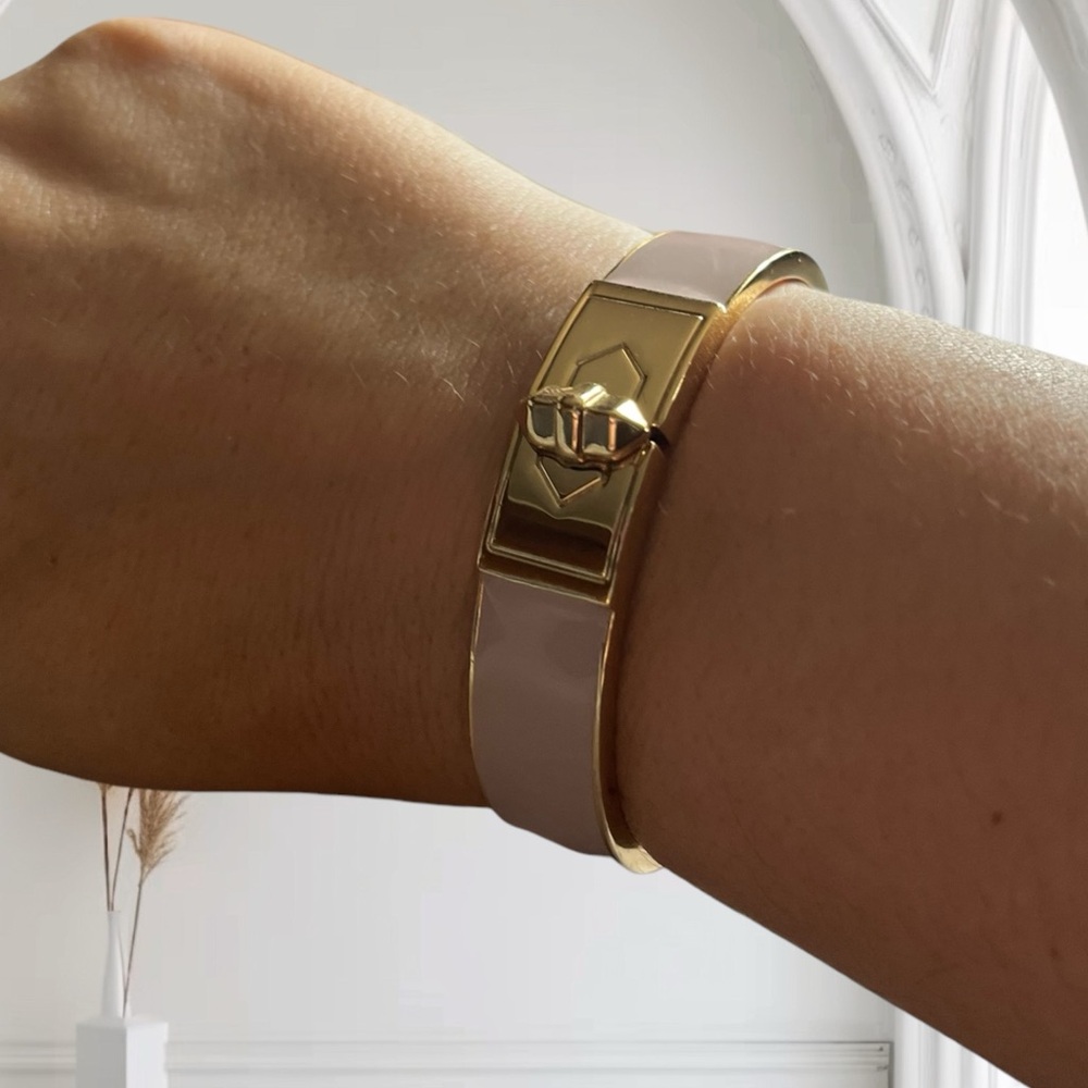 New Stella & Dot bracelet. Bangle is hinged and magnetic in blush pink and gold